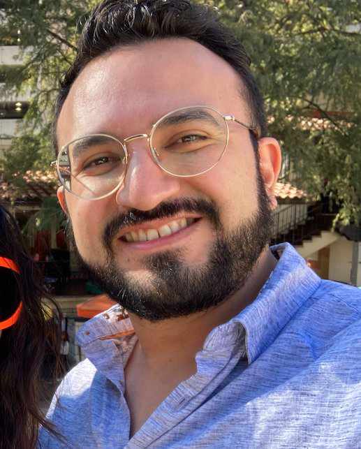 Handsome guy with glasses smiling